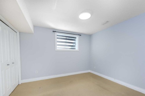 192 Cove Rise Rise, Chestermere, AB - Indoor Photo Showing Other Room