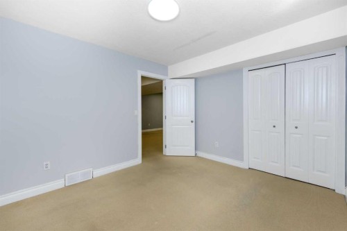 192 Cove Rise Rise, Chestermere, AB - Indoor Photo Showing Other Room