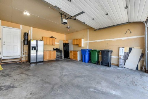 192 Cove Rise Rise, Chestermere, AB - Indoor Photo Showing Garage