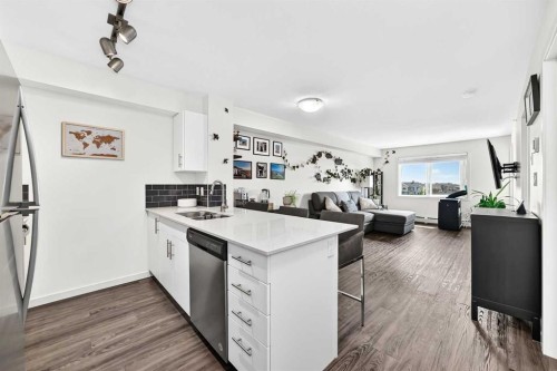 1406-181 Skyview Ranch Manor Ne, Calgary, AB - Indoor Photo Showing Kitchen With Double Sink
