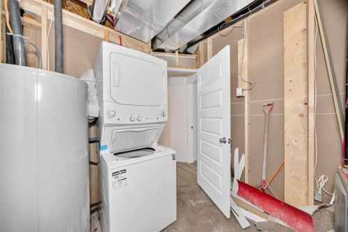 20 Corner Glen Avenue Ne, Calgary, AB - Indoor Photo Showing Laundry Room