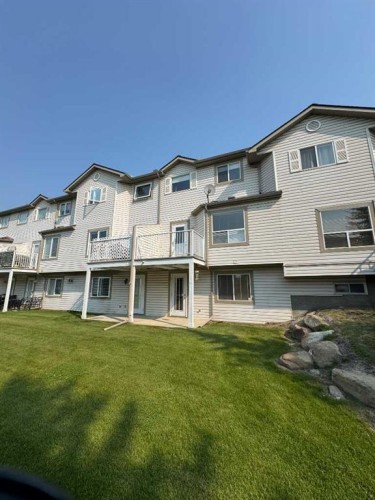 108 Douglas Glen Park Se, Calgary, AB - Outdoor With Balcony With Deck Patio Veranda