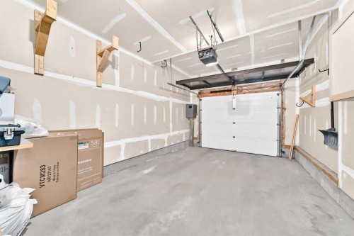 108 Douglas Glen Park Se, Calgary, AB - Indoor Photo Showing Garage