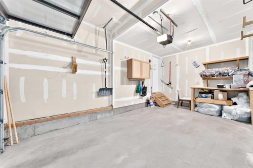 108 Douglas Glen Park Se, Calgary, AB - Indoor Photo Showing Garage