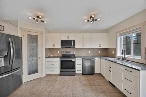 130 Panamount Road Nw, Calgary, AB - Indoor Photo Showing Kitchen With Stainless Steel Kitchen