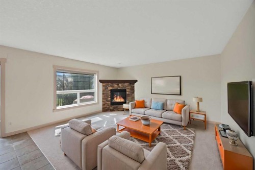 130 Panamount Road Nw, Calgary, AB - Indoor Photo Showing Living Room With Fireplace