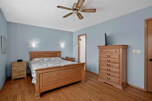 105 Riverview Court Se, Calgary, AB - Indoor Photo Showing Bedroom