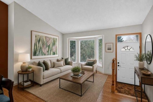 105 Riverview Court Se, Calgary, AB - Indoor Photo Showing Living Room