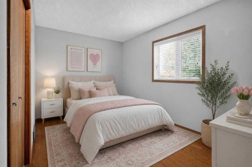 105 Riverview Court Se, Calgary, AB - Indoor Photo Showing Bedroom