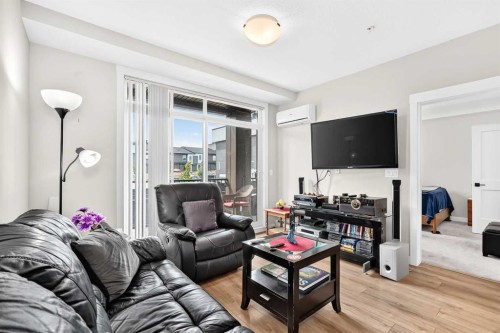 6106-200 Seton Circle Se, Calgary, AB - Indoor Photo Showing Living Room