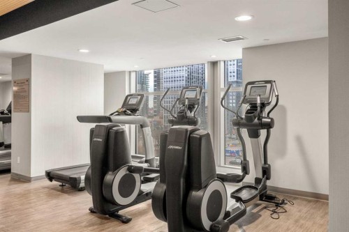 709-1122 3 Street Se, Calgary, AB - Indoor Photo Showing Gym Room