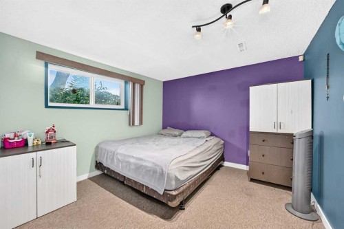 1823 65 Street Ne, Calgary, AB - Indoor Photo Showing Bedroom