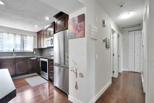 1015 Maitland Way Ne, Calgary, AB - Indoor Photo Showing Kitchen With Double Sink