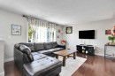 1015 Maitland Way Ne, Calgary, AB  - Indoor Photo Showing Living Room 