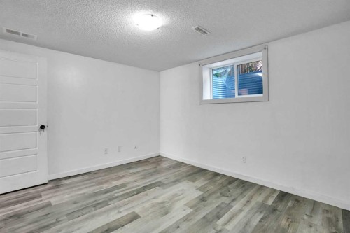 1015 Maitland Way Ne, Calgary, AB - Indoor Photo Showing Other Room
