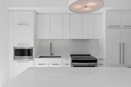 408-3130 Thirsk Street Nw, Calgary, AB - Indoor Photo Showing Kitchen With Double Sink With Upgraded Kitchen