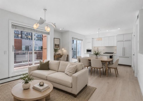 408-3130 Thirsk Street Nw, Calgary, AB - Indoor Photo Showing Living Room
