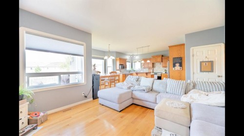 8 Logan Court, Sylvan Lake, AB - Indoor Photo Showing Living Room