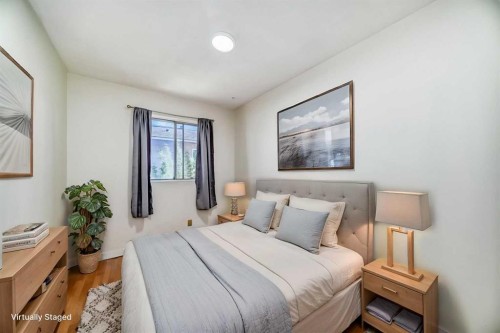7807 20A Street Se, Calgary, AB - Indoor Photo Showing Bedroom