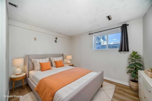 7807 20A Street Se, Calgary, AB - Indoor Photo Showing Bedroom