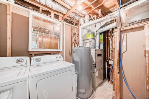 7807 20A Street Se, Calgary, AB - Indoor Photo Showing Laundry Room