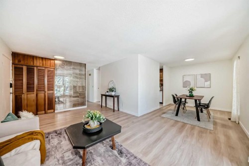 7807 20A Street Se, Calgary, AB - Indoor Photo Showing Living Room