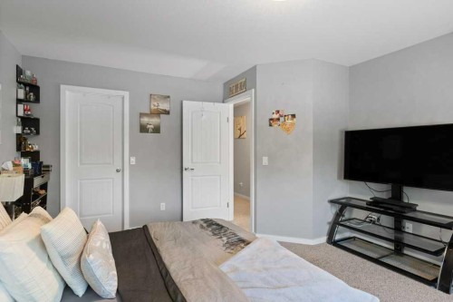 604 7 Street Nw, High River, AB - Indoor Photo Showing Bedroom