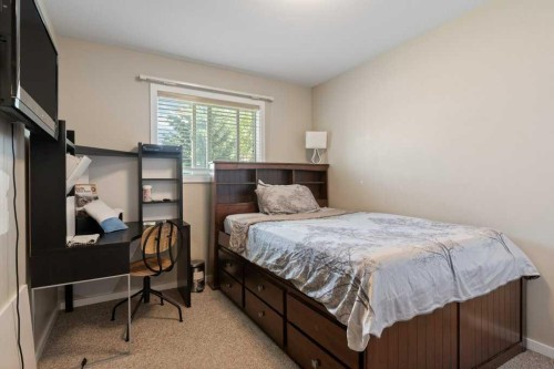 604 7 Street Nw, High River, AB - Indoor Photo Showing Bedroom