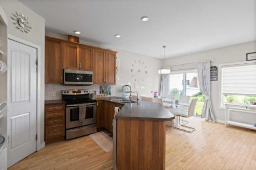 604 7 Street Nw, High River, AB - Indoor Photo Showing Kitchen With Double Sink