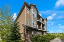 205-250 Fireside View, Cochrane, AB  - Outdoor With Balcony 