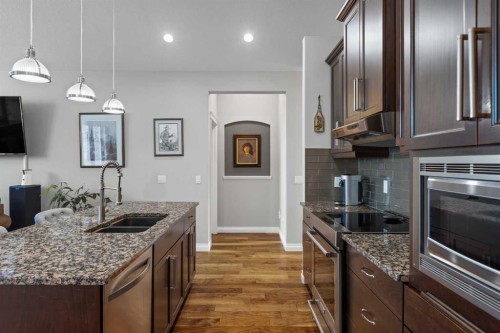2170 High Country Rise Nw, High River, AB - Indoor Photo Showing Kitchen With Double Sink With Upgraded Kitchen