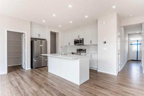 4041 Southwinds Way Sw, Airdrie, AB - Indoor Photo Showing Kitchen With Stainless Steel Kitchen With Upgraded Kitchen