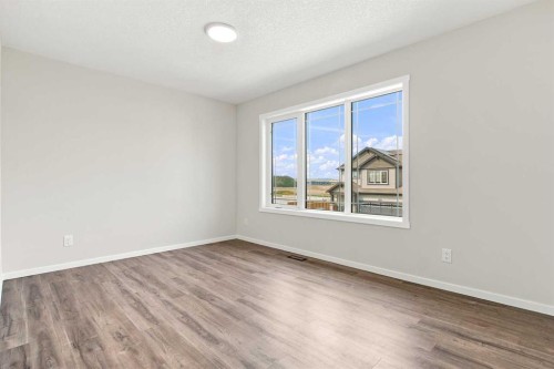 4041 Southwinds Way Sw, Airdrie, AB - Indoor Photo Showing Other Room