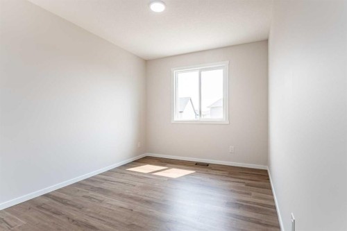 4041 Southwinds Way Sw, Airdrie, AB - Indoor Photo Showing Other Room