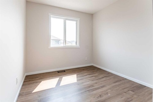 4041 Southwinds Way Sw, Airdrie, AB - Indoor Photo Showing Other Room