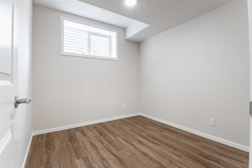 4041 Southwinds Way Sw, Airdrie, AB - Indoor Photo Showing Other Room