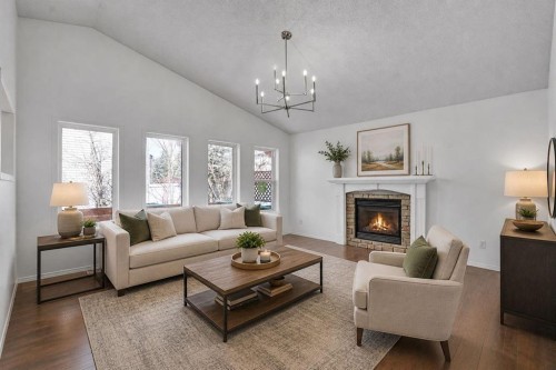 89 Everoak Drive Sw, Calgary, AB - Indoor Photo Showing Living Room With Fireplace