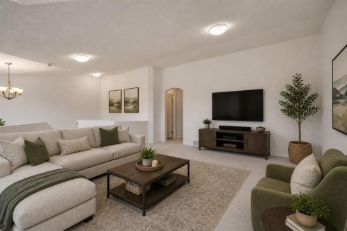 89 Everoak Drive Sw, Calgary, AB - Indoor Photo Showing Living Room