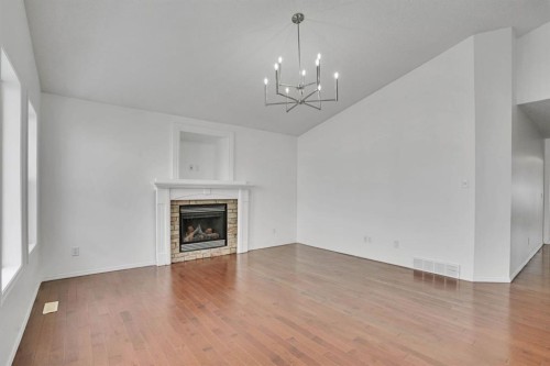 89 Everoak Drive Sw, Calgary, AB - Indoor Photo Showing Other Room With Fireplace
