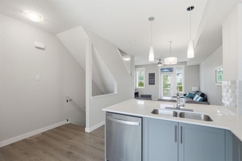 187 Legacy Common Se, Calgary, AB - Indoor Photo Showing Kitchen With Double Sink
