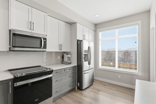 187 Legacy Common Se, Calgary, AB - Indoor Photo Showing Kitchen