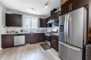 261 Redstone Street Ne, Calgary, AB  - Indoor Photo Showing Kitchen With Double Sink 