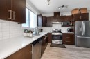 261 Redstone Street Ne, Calgary, AB  - Indoor Photo Showing Kitchen With Double Sink With Upgraded Kitchen 