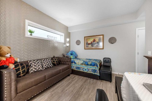 261 Redstone Street Ne, Calgary, AB - Indoor Photo Showing Bedroom