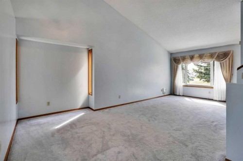 21 La Valencia Green Ne, Calgary, AB - Indoor Photo Showing Other Room