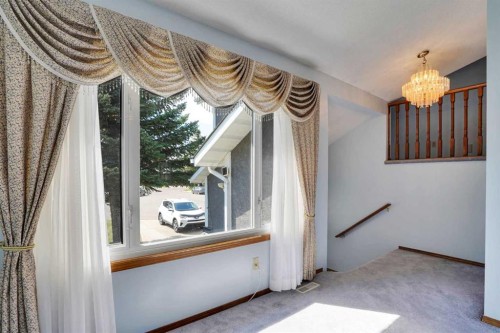 21 La Valencia Green Ne, Calgary, AB - Indoor Photo Showing Other Room