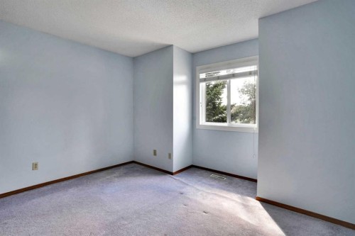 21 La Valencia Green Ne, Calgary, AB - Indoor Photo Showing Other Room