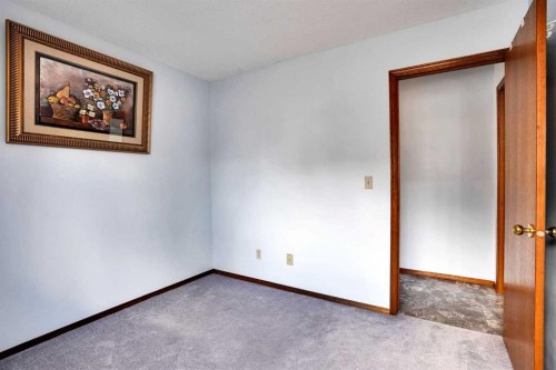21 La Valencia Green Ne, Calgary, AB - Indoor Photo Showing Other Room