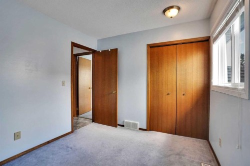 21 La Valencia Green Ne, Calgary, AB - Indoor Photo Showing Other Room