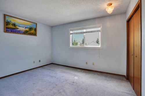 21 La Valencia Green Ne, Calgary, AB - Indoor Photo Showing Other Room